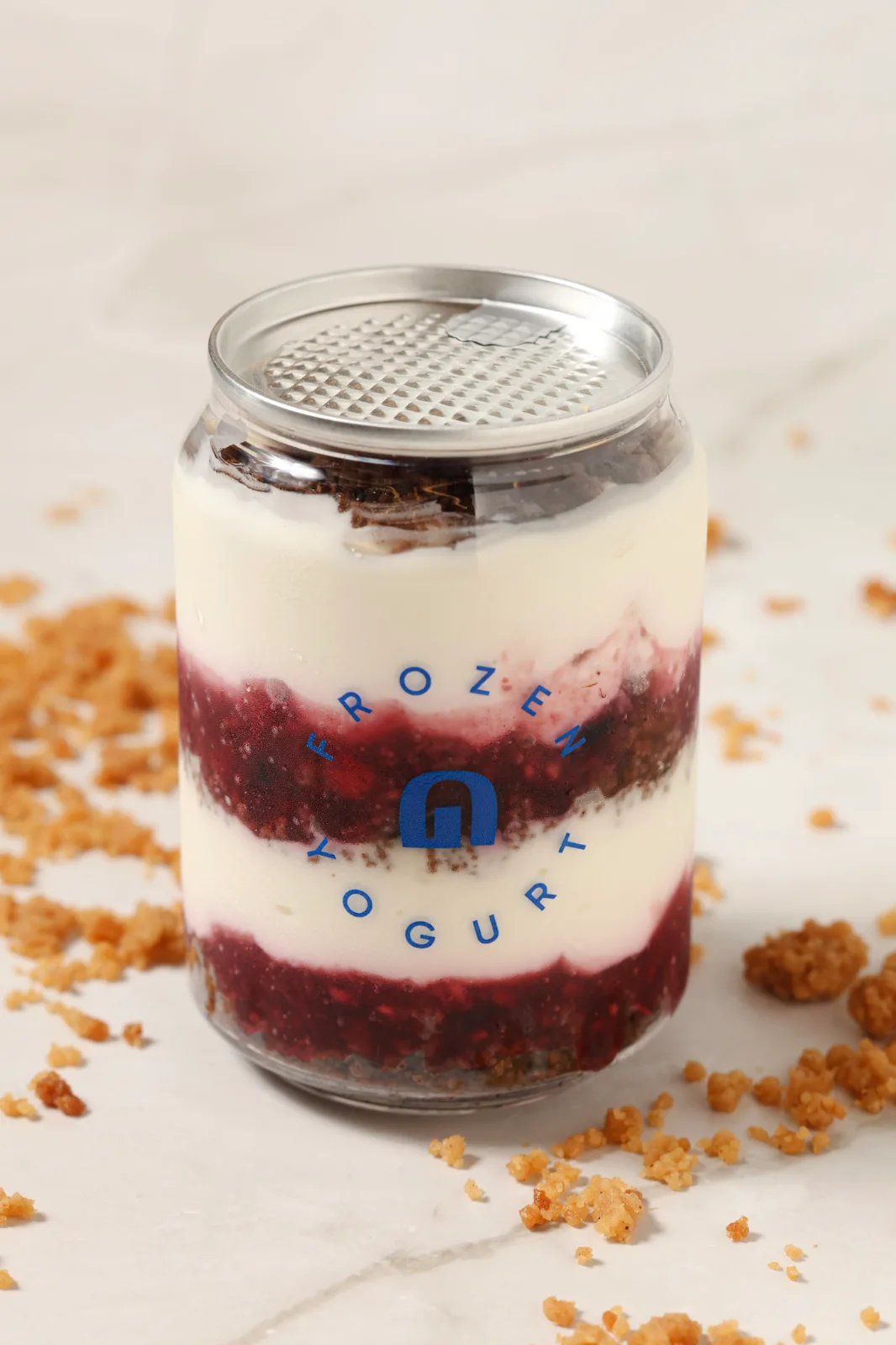 Bite de cheesecake con frutos rojos en frasco GRYK