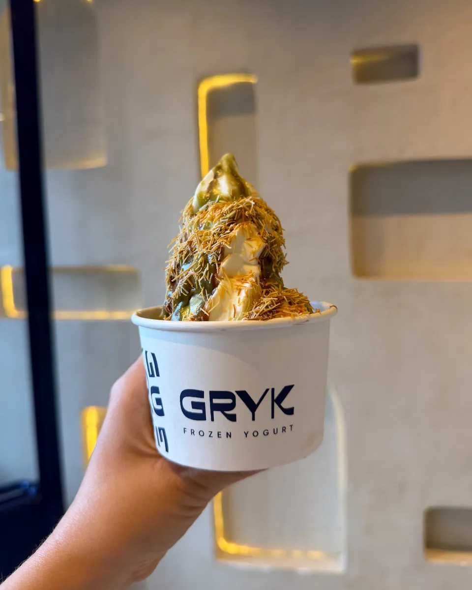 Un Gryk en la mano de un cliente