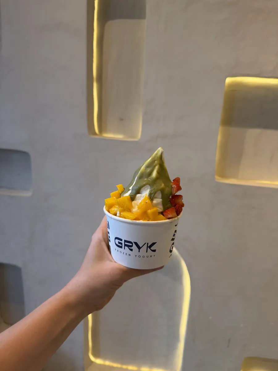 Un Gryk en la mano de un cliente