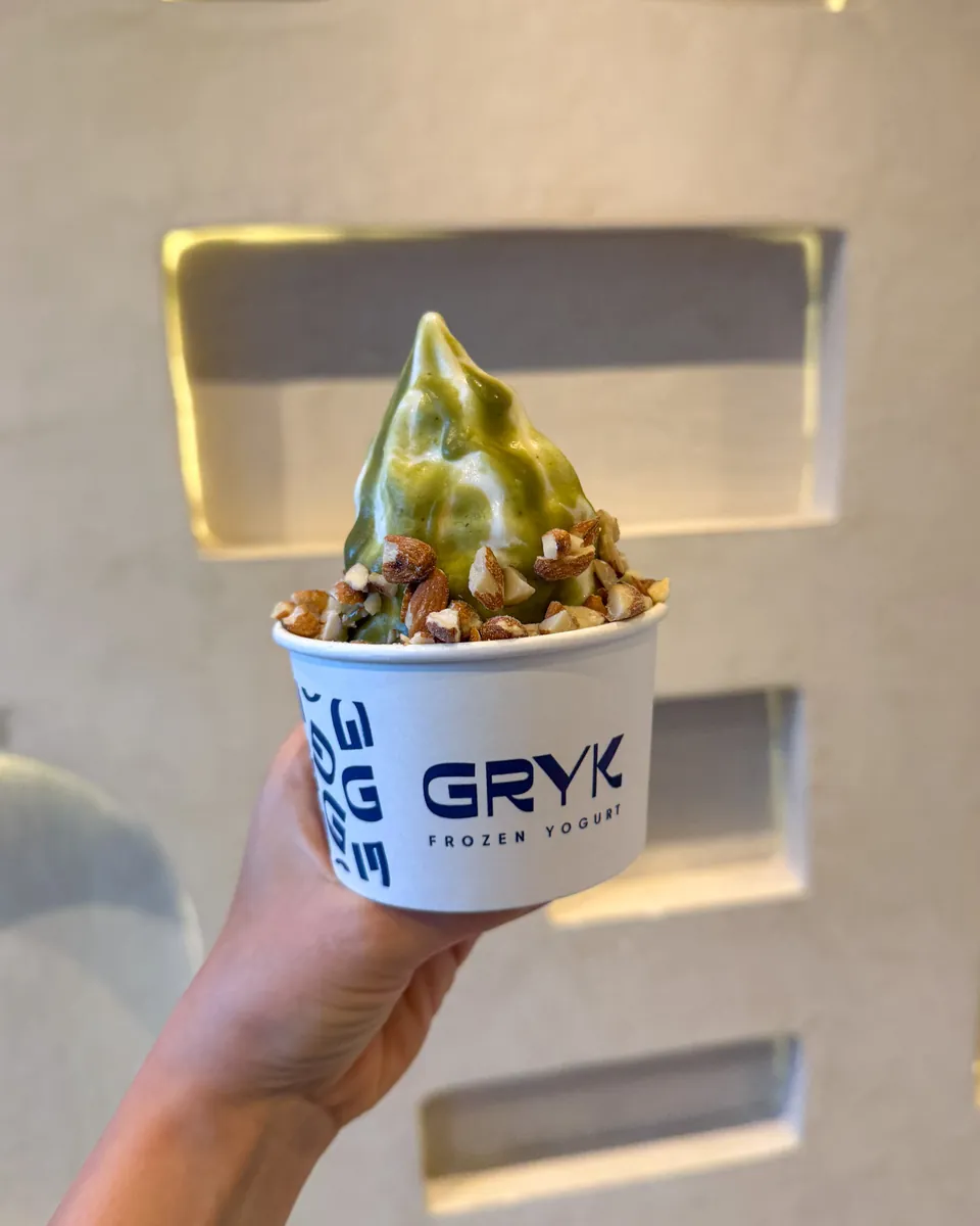 Un Gryk en la mano de un cliente