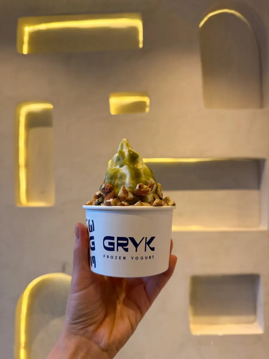 Un Gryk en la mano de un cliente