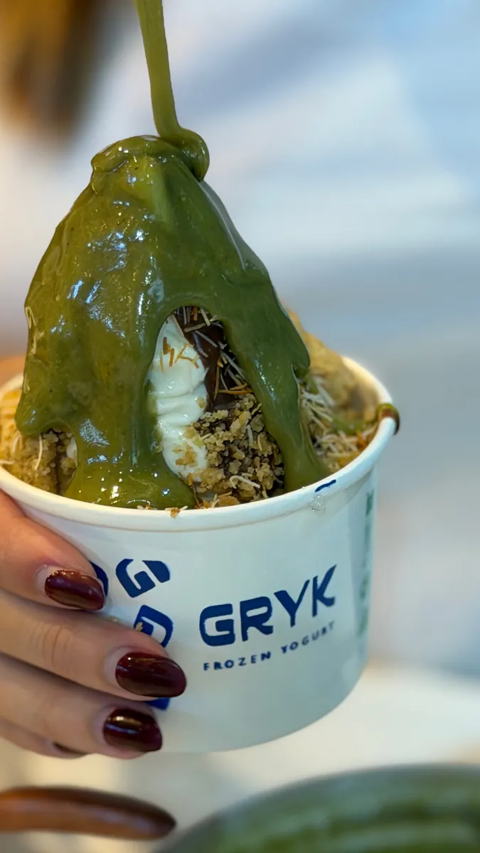 Un Gryk en la mano de un cliente